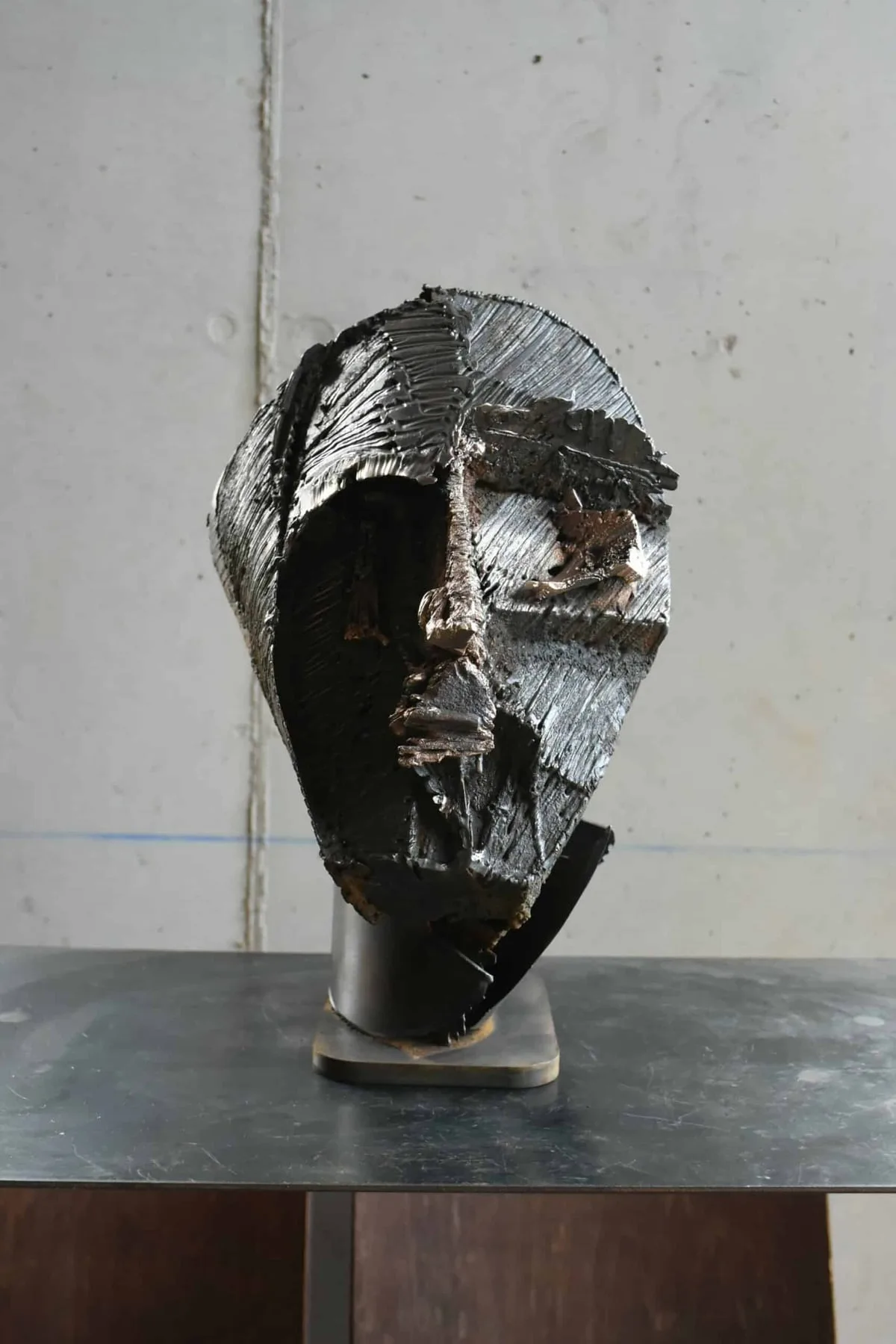 Sculpture Acier et Bronze de Julien Allègre : Tête profonde de Julien Allègre