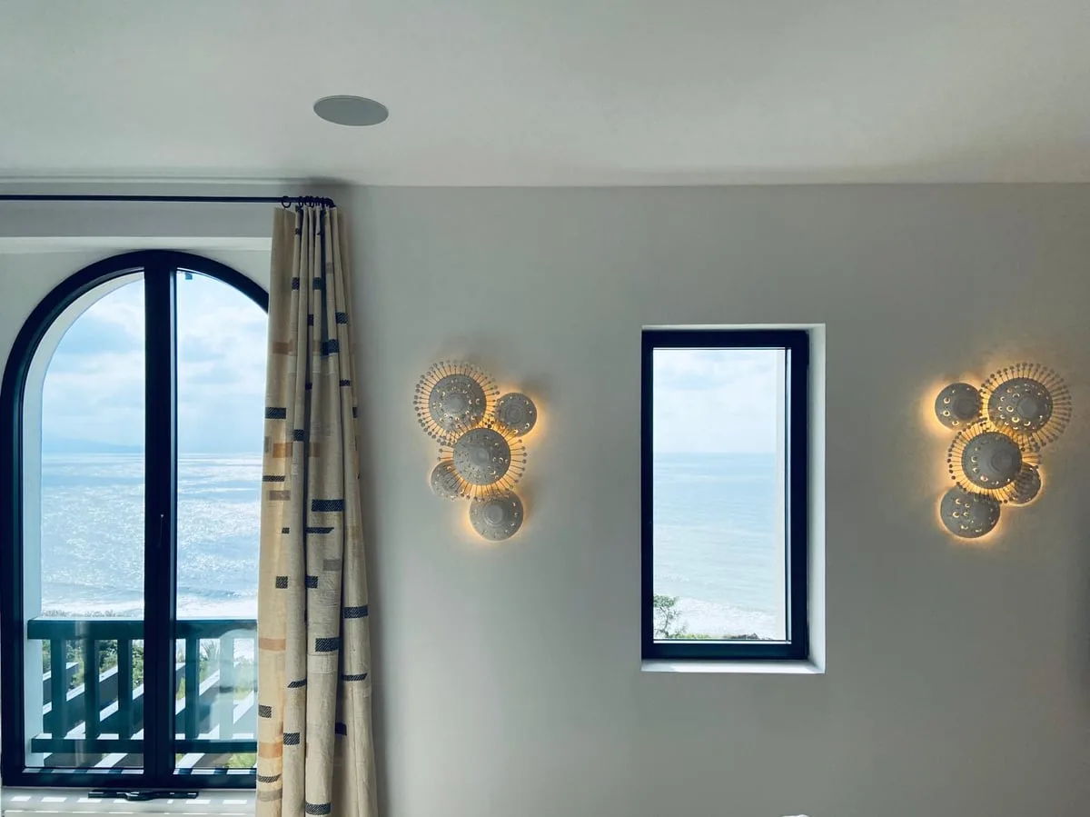 Sunshine wall sconces in glazed white ceramic by Georges Pelletier — View 2